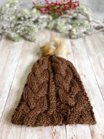 Women’s chunky cabled beanie with pompom
