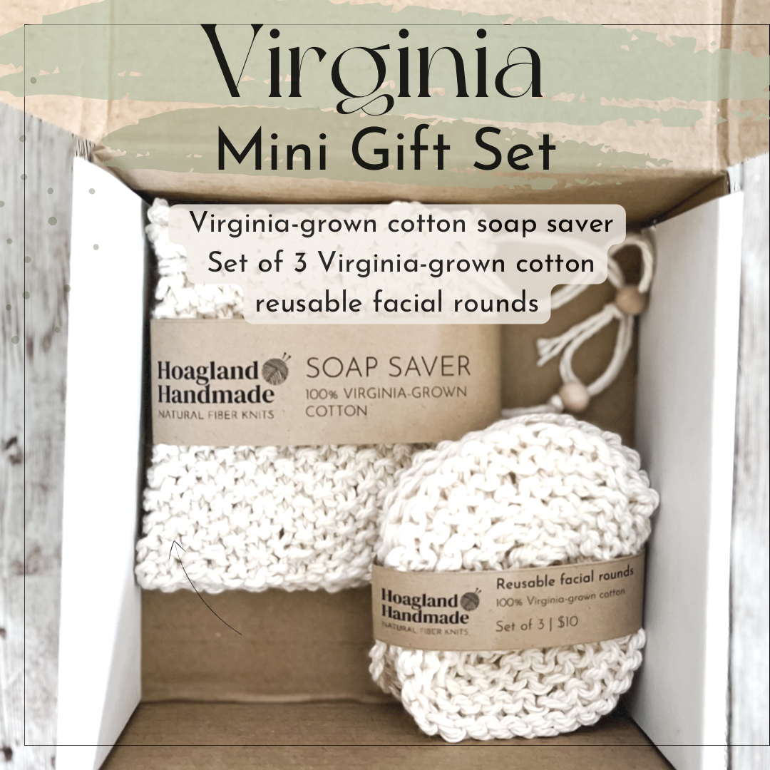 A white box contains a Virginia-grown cotton soap saver and set of reusable facial rounds. The text reads "Virginia Mini Gift Set" and includes a list of the 2 items included.